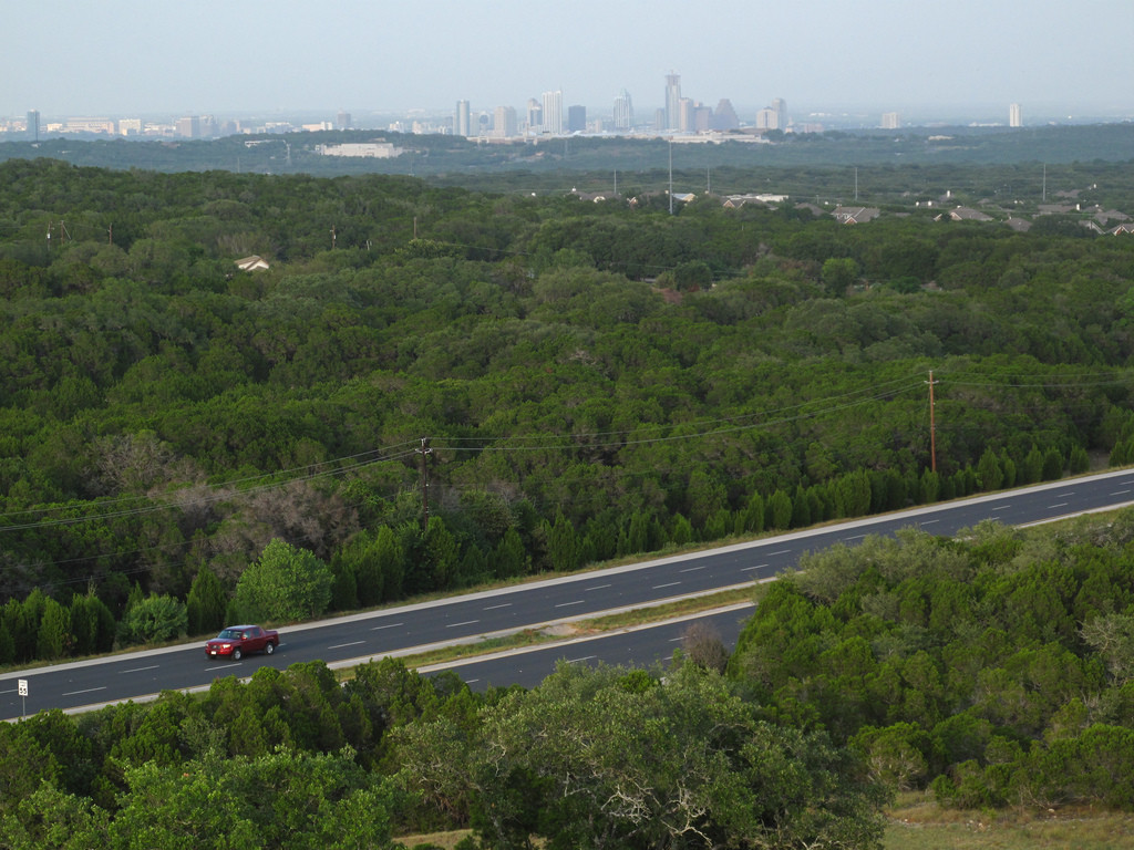 Photo: Southwest Parkway with the Austin skyline in the background. Flickr user Matthew Rutledge, creative commons licensed. 