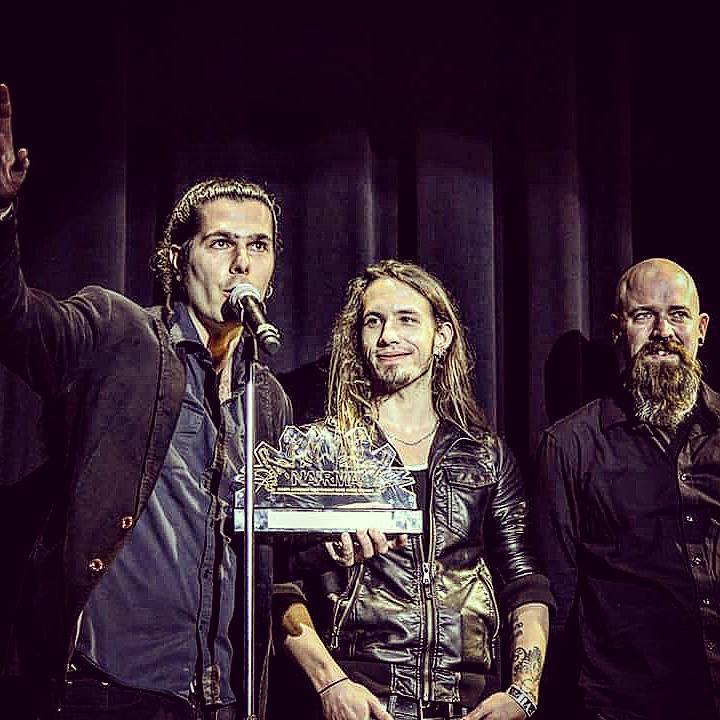 <I>Seek Irony accepting Album of the Year at the North American Independent Rock Music Awards in 2016. <a href="https://www.facebook.com/SeekIrony/photos/pb.6430439063.-2207520000.1458154326./10153576689149064/?type=3&theater" target="_blank">Photo via Facebook</a>.</I>