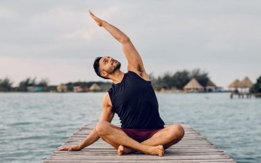 Ease Your Travel Anxiety With These 5 Simple Yoga Stretches From Wellness Expert Gustavo Padron