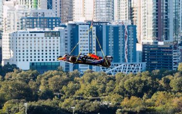 These Pictures Of The Red Bull Racing Car Flying Over Downtown Austin Are The Most Extra F1 Thing We’ve Ever Seen